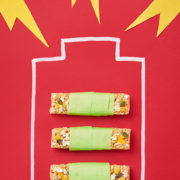 Energy bars on a red background inside the illustration of a battery.