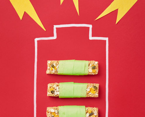 Energy bars on a red background inside the illustration of a battery.